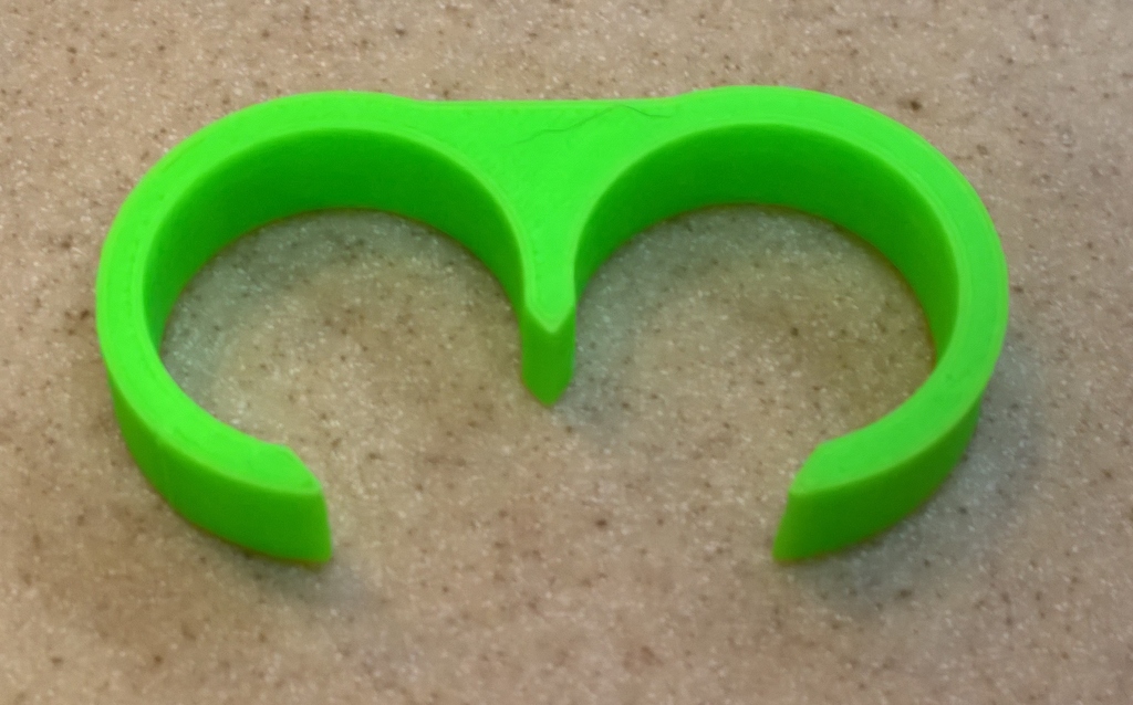 1" Clip Hook Snaps to Medical Walker to hang things.