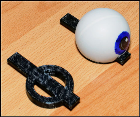 Movable eye adapter for puppet eyelid
