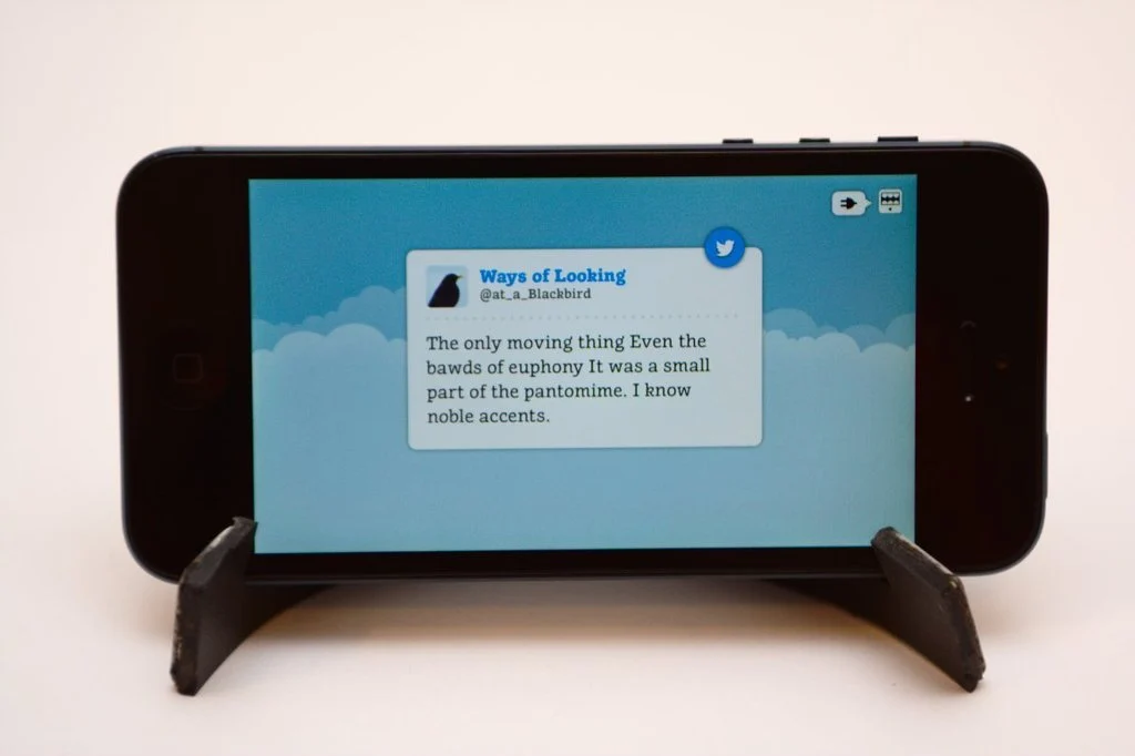 A strappy laser-cut iPhone 5 stand