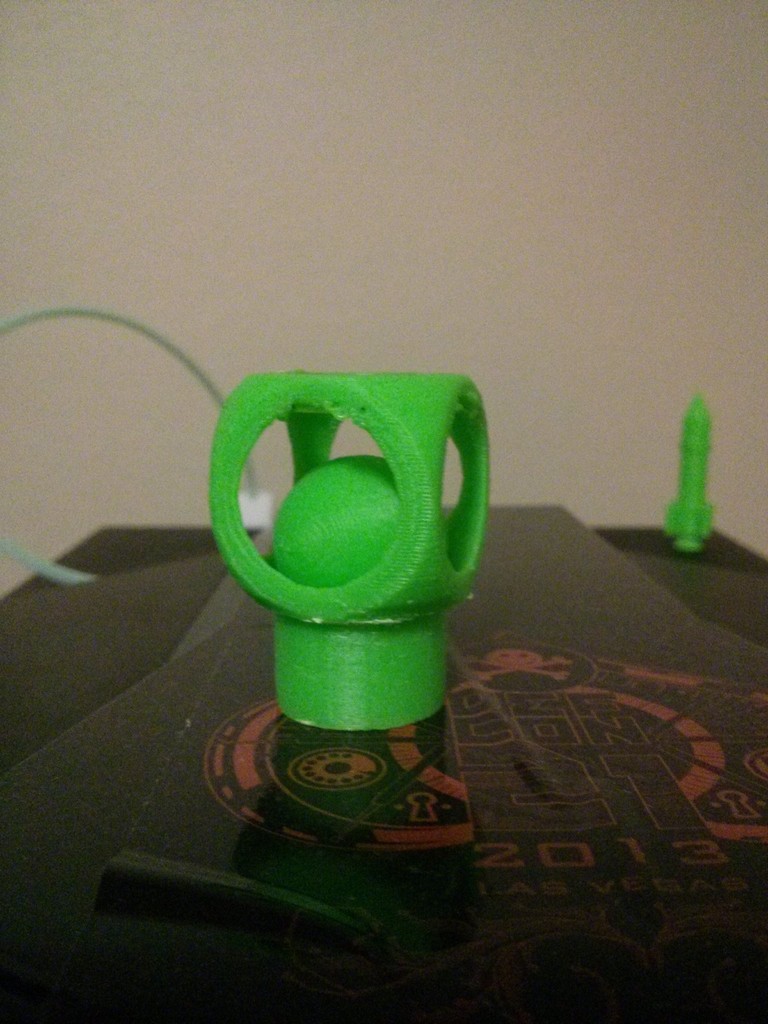 captive sphere on a stand