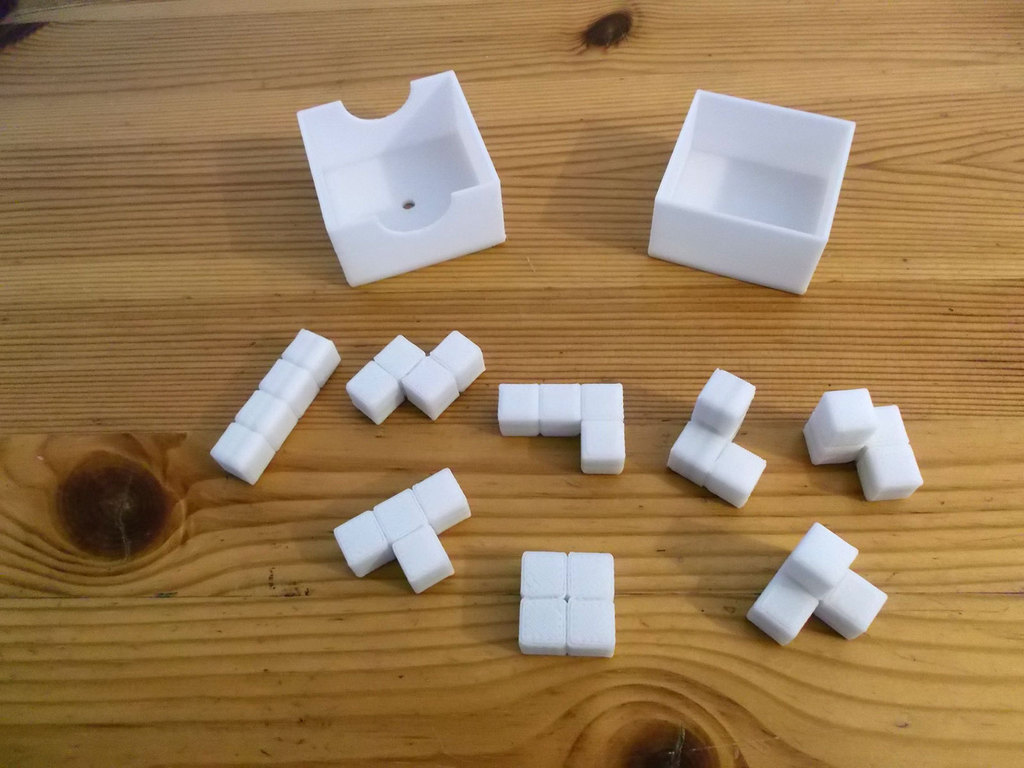 3D Tetris pieces puzzle with box