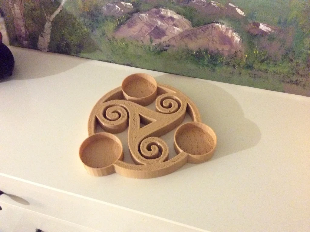 Triskelion tealight holder