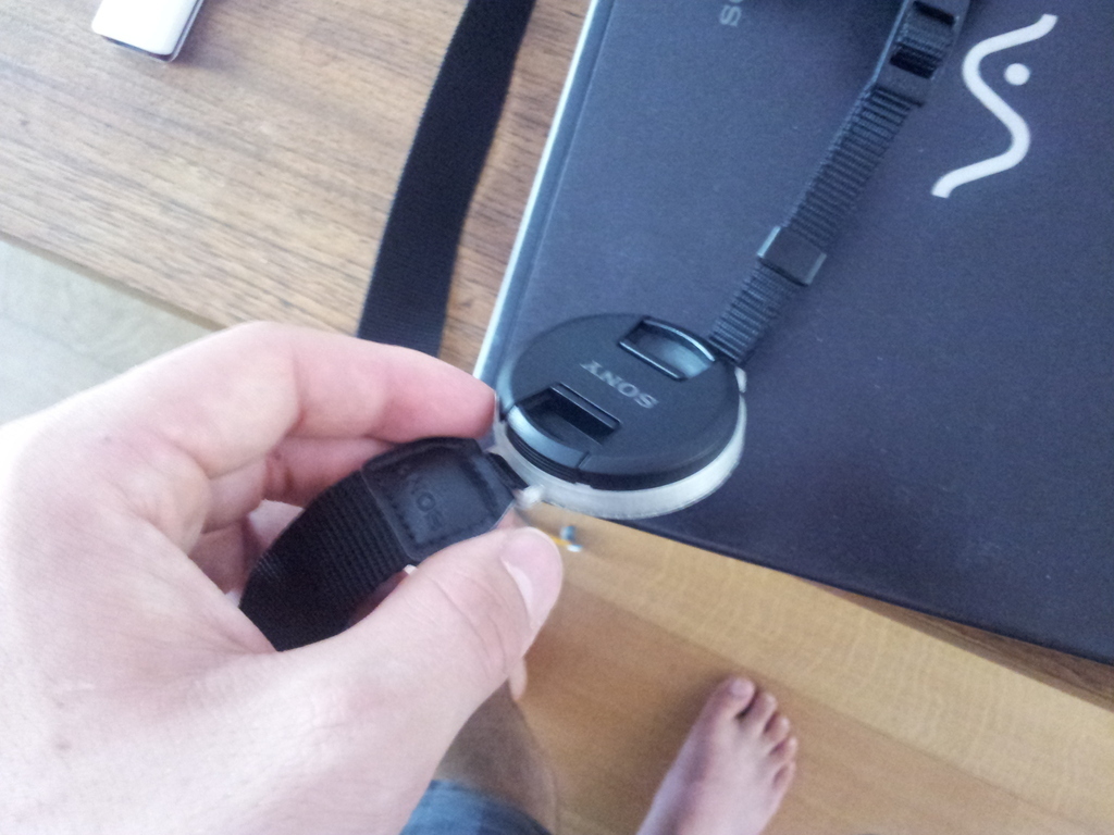 Lens cap holder for 49mm Diameter