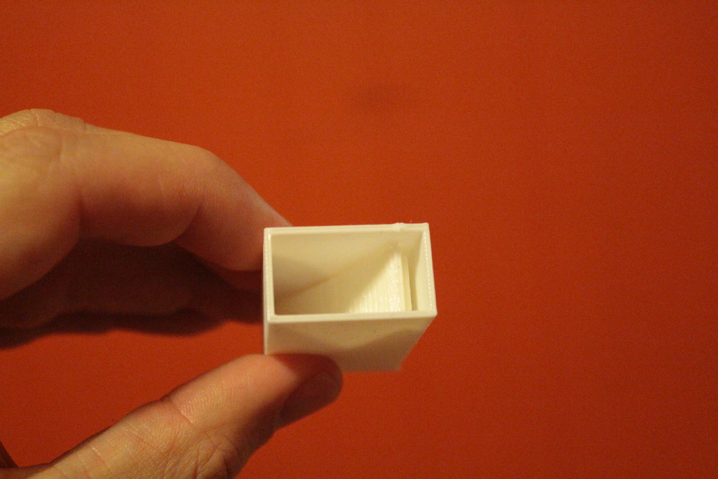 One way valve with a flap.