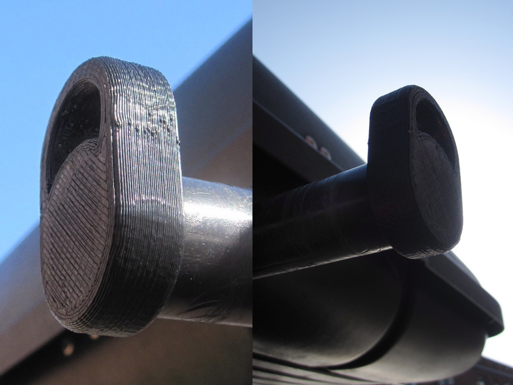 Yakima bar end cap with tie-down loop