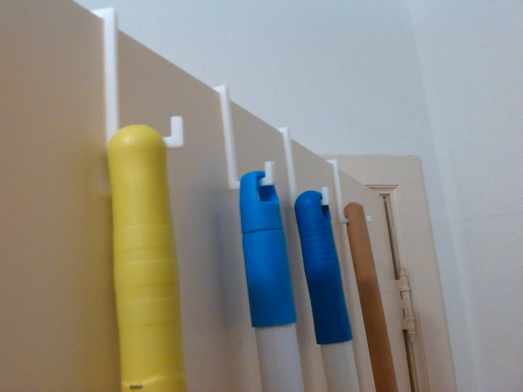 Door hook (for brooms,clothes,...)
