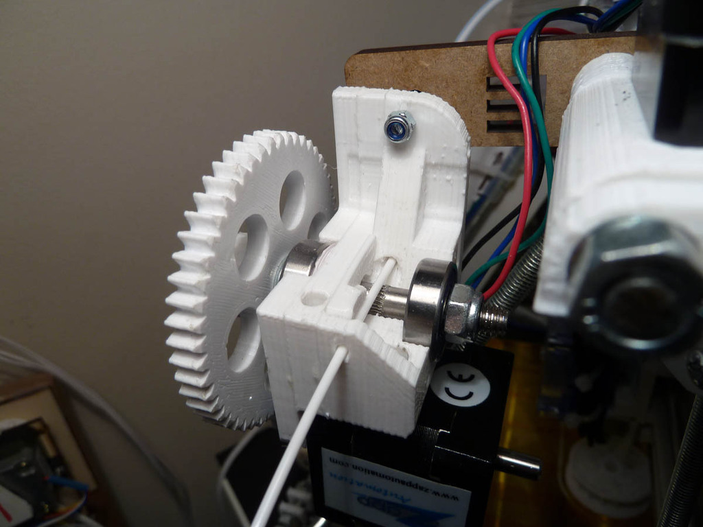Simple extruder filament guide for eMAKER Huxley