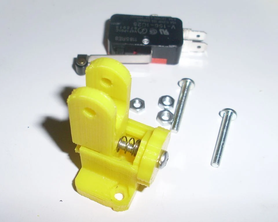 Thumb adjustable z-axis microswitch