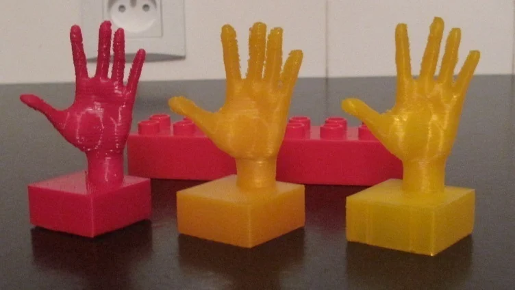 Hand on duplo-compatible block
