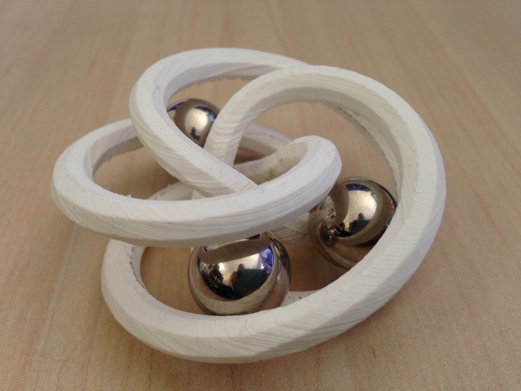 3 turn single torus - flexible kinetic art / penholder