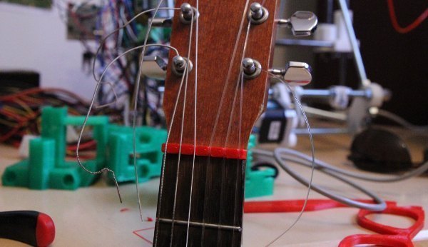 Nut for acoustic guitars