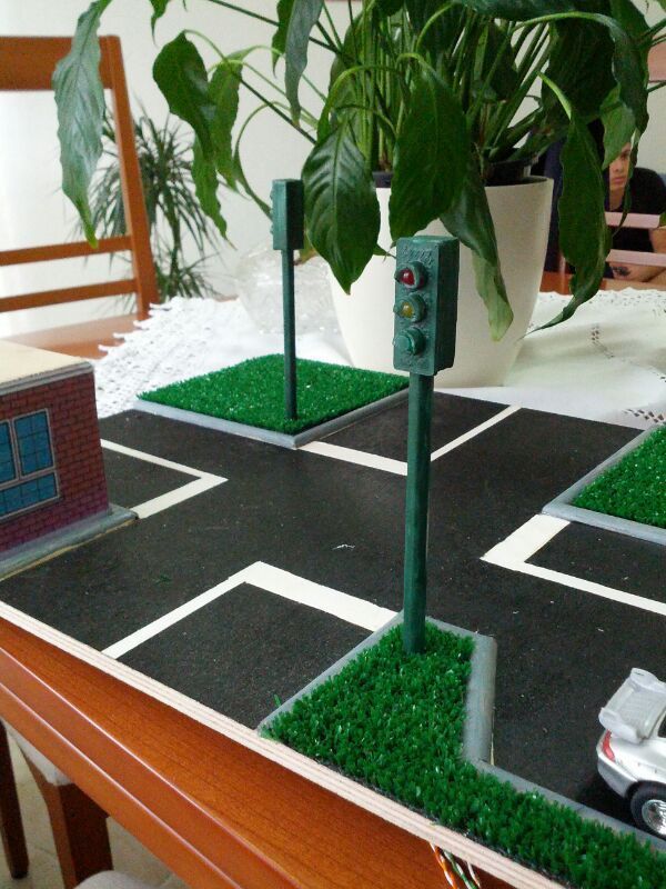 small traffic light for a plastico road