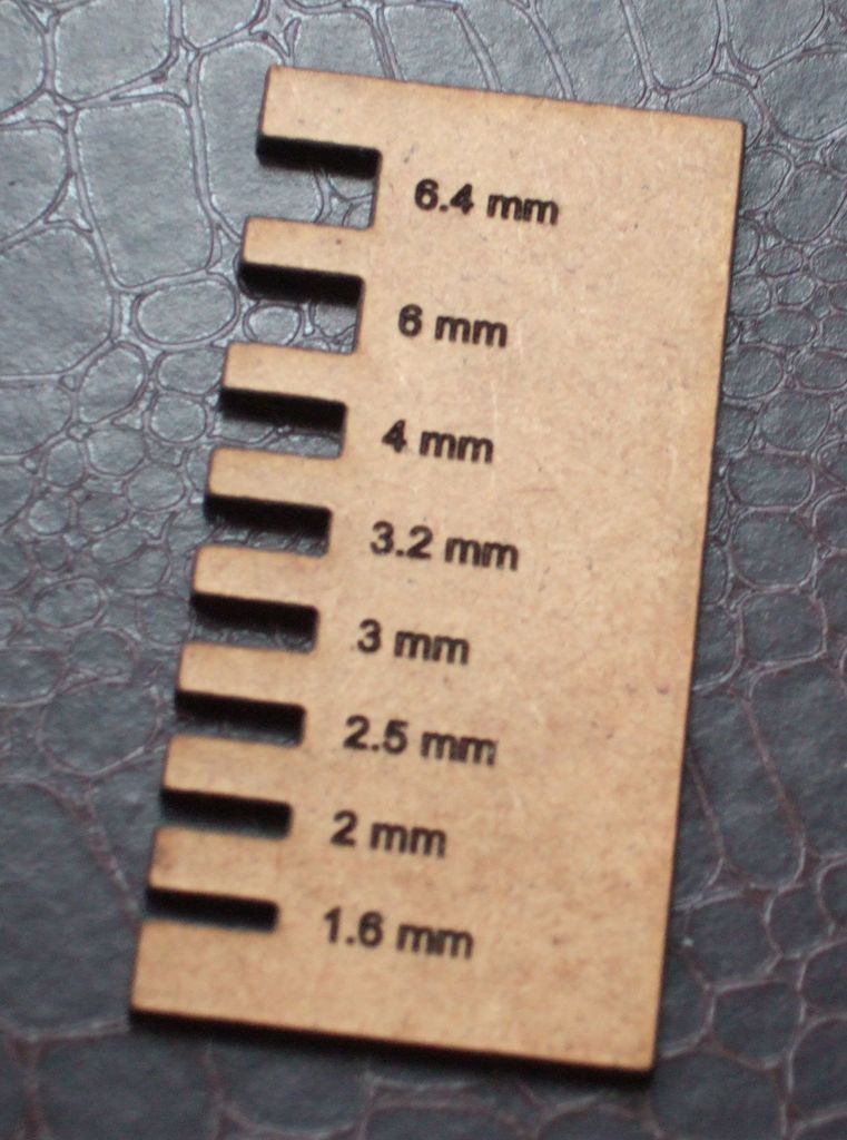 Sheet thickness gauge