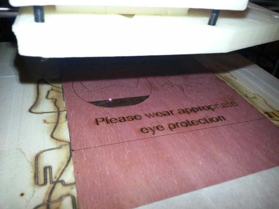 Laser cutting warning plate