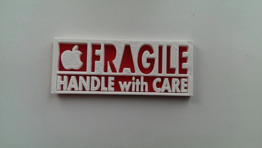 Fragile stamp with apple logo