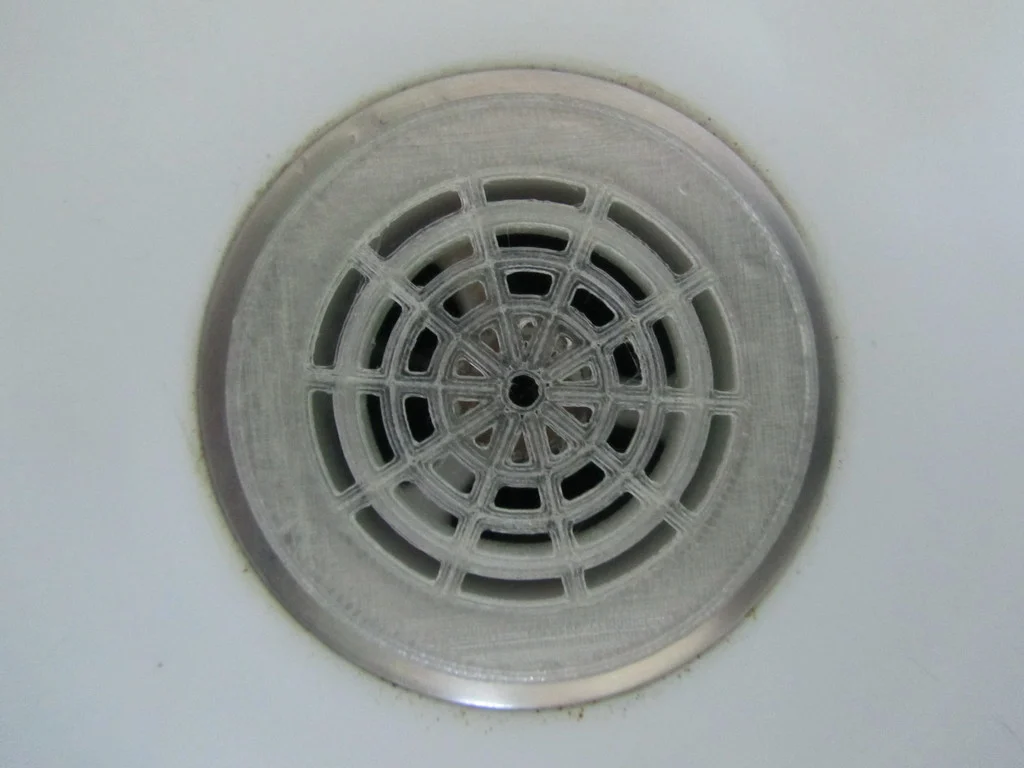 Hair trap for shower drain