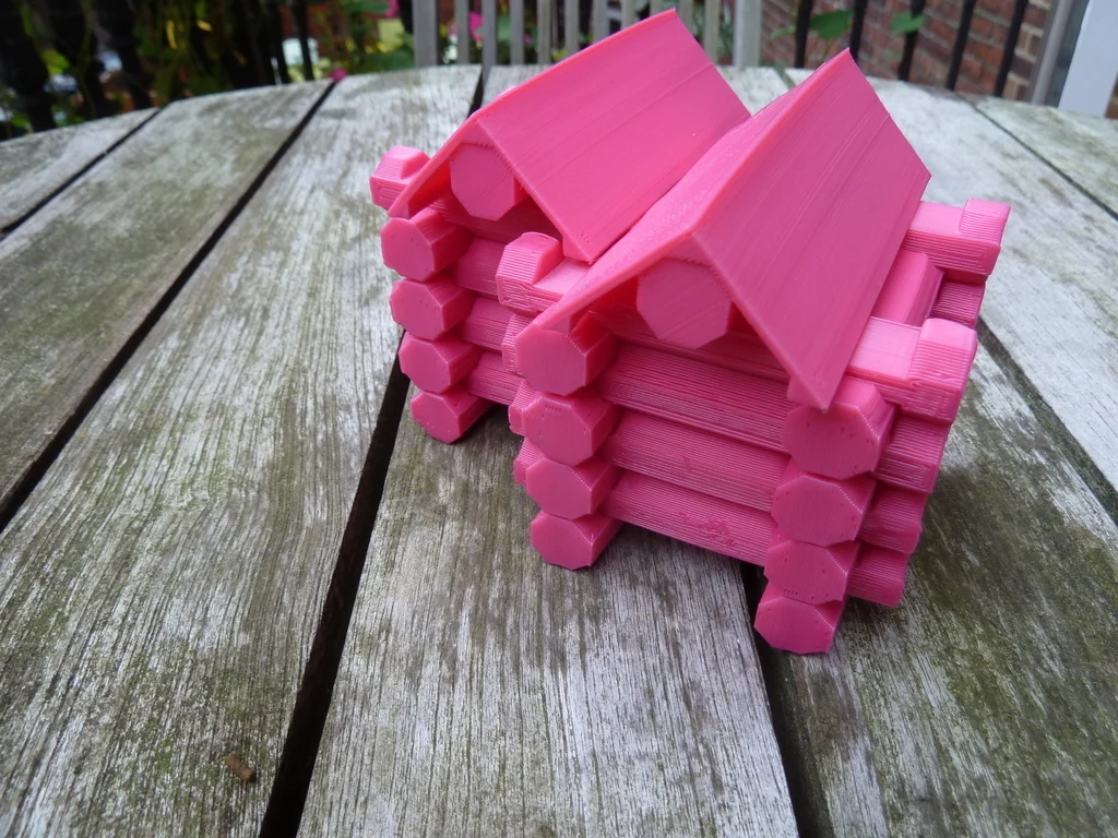 Stacking Logs for a Log Cabin