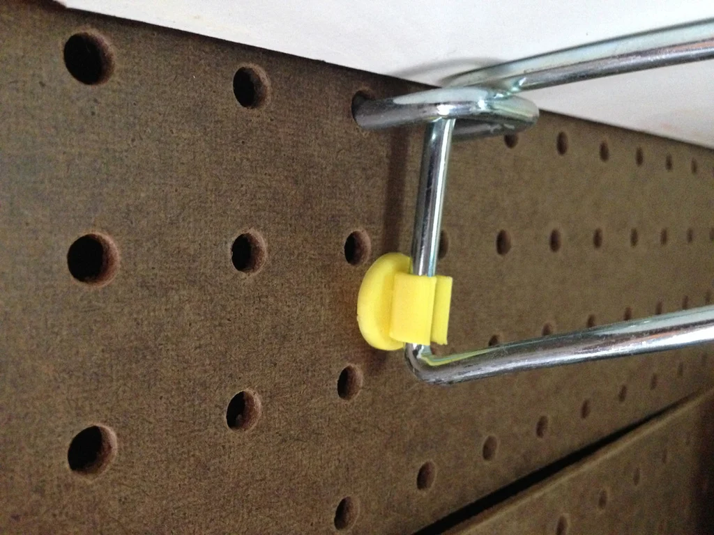 Peg board shelf bracket spacer. Got droopy shelves?