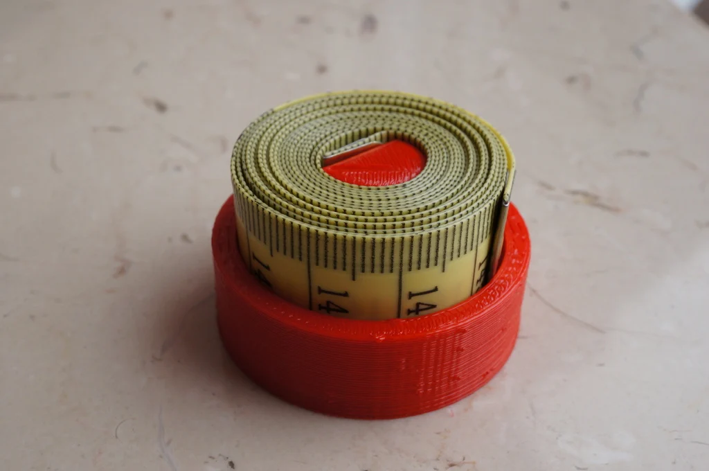 Holder for a measuring tape