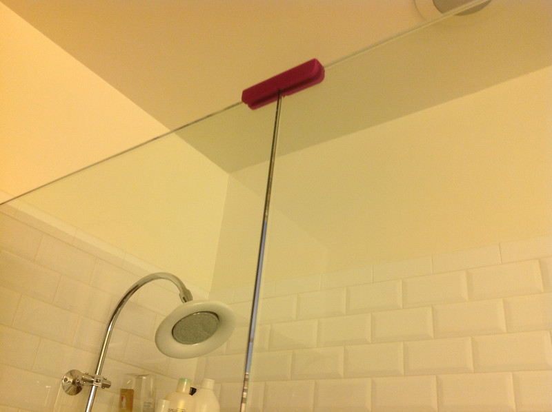 Shower door clip