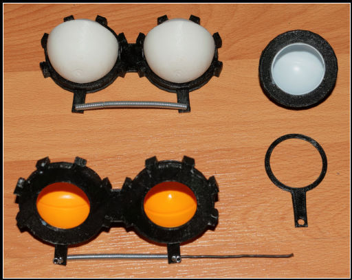 Movable eyes for the ping pong ball with eyelid