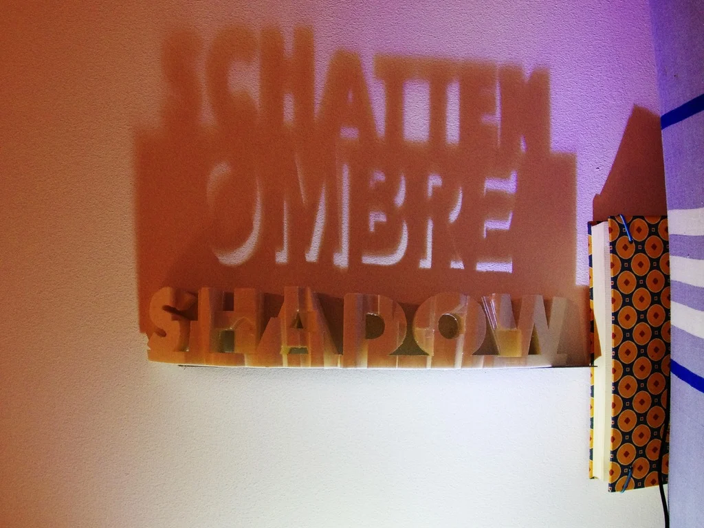 Tri-lingual shadow text