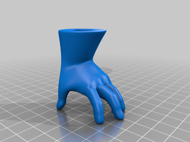 Ambidextrous hand model/pen holder