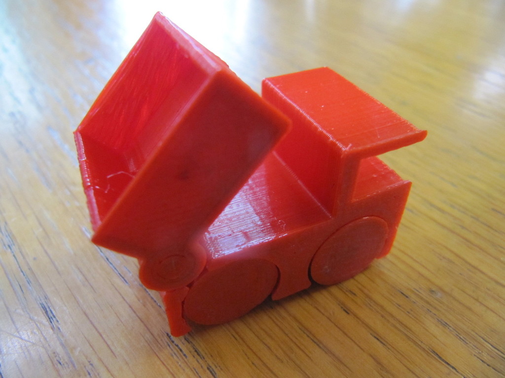 Tiny Toy Dump Truck Rounder