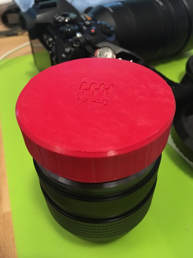 Olympus 12-40mm lens cap with bayonet fitting for filters