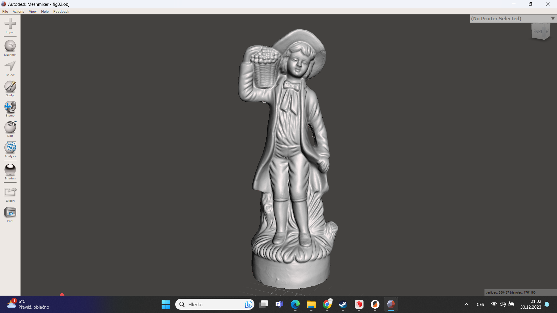 Antique figure - a man with a basket on his shoulder