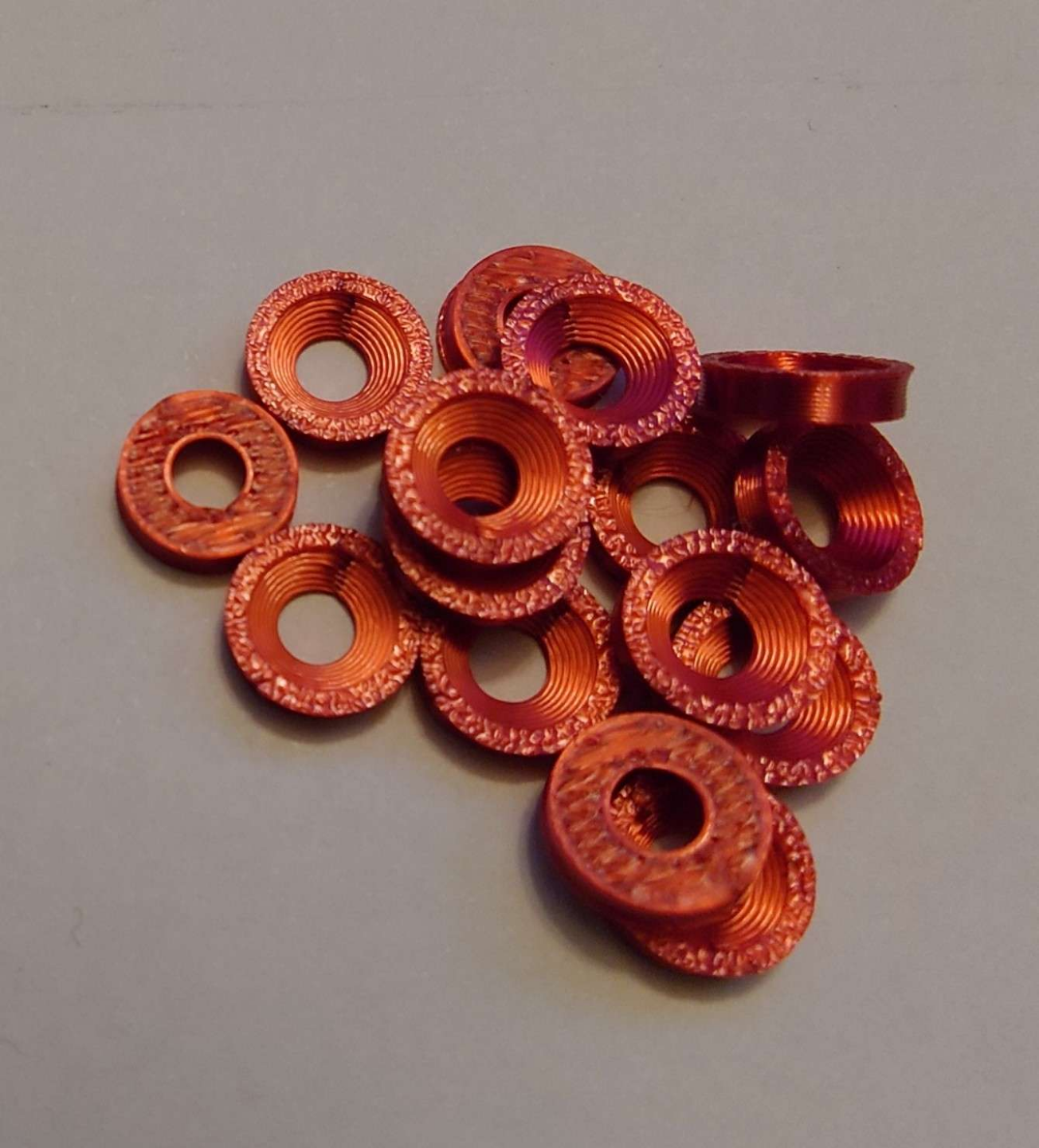 Washers for countersunk screws.