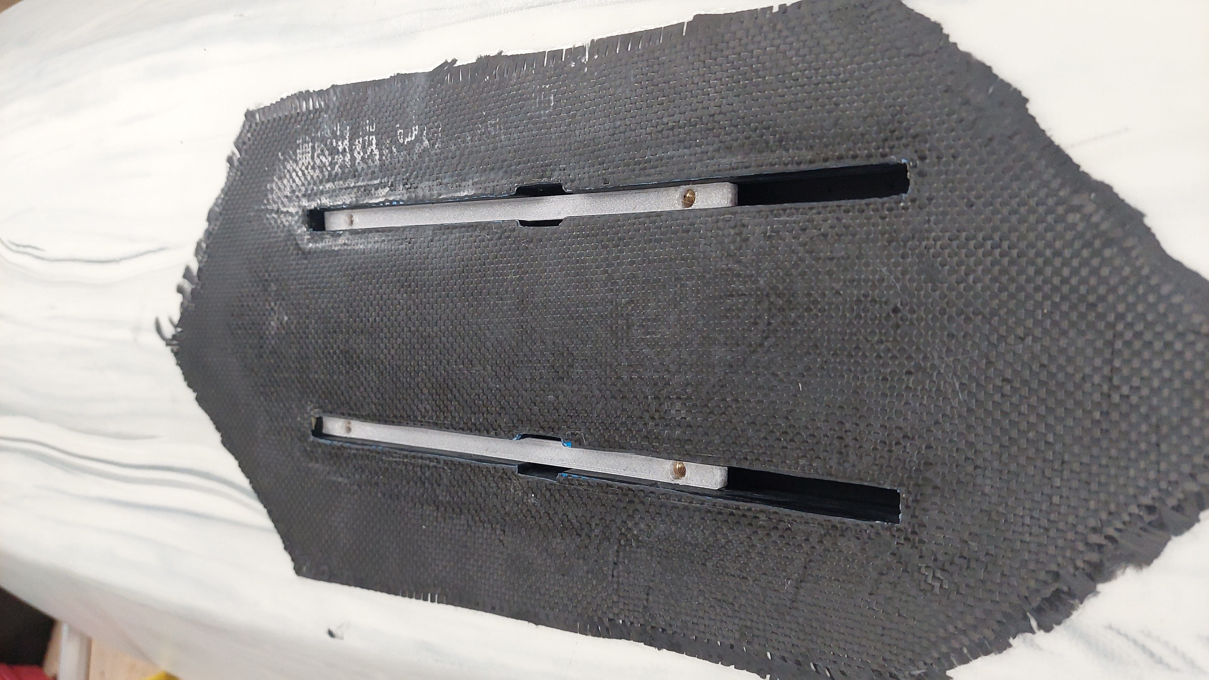 Foil board track spacer