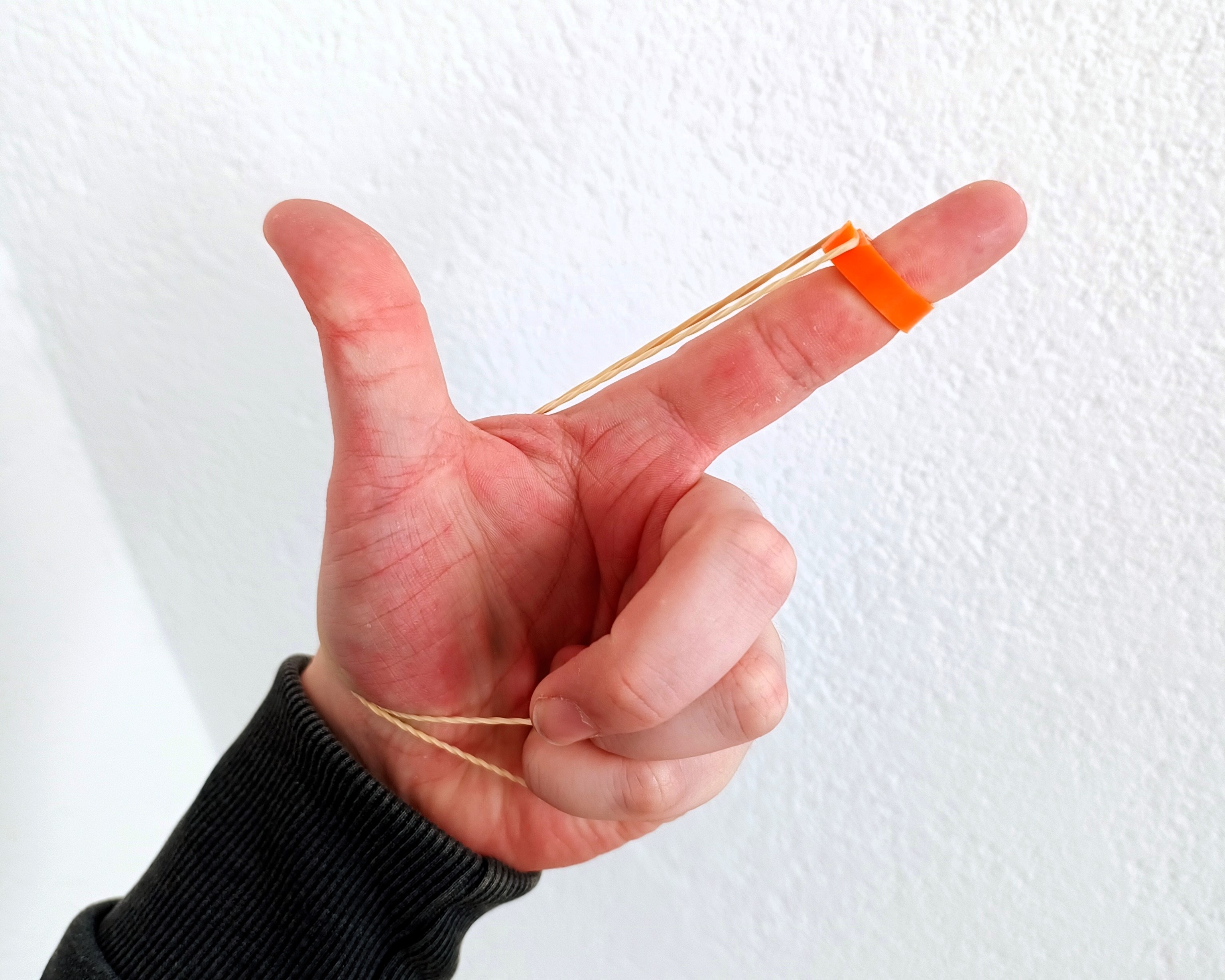 Keychain finger rubber band gun