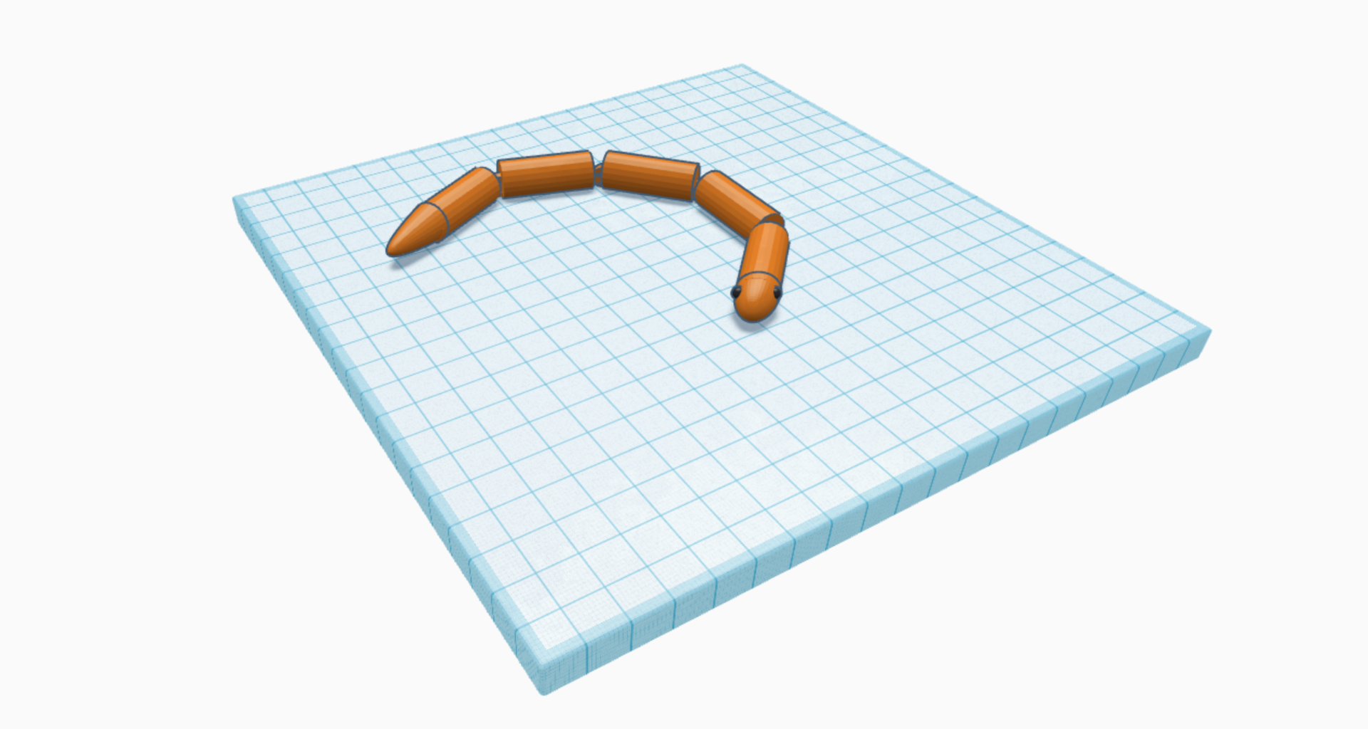 Moveable orange snake with black eyes