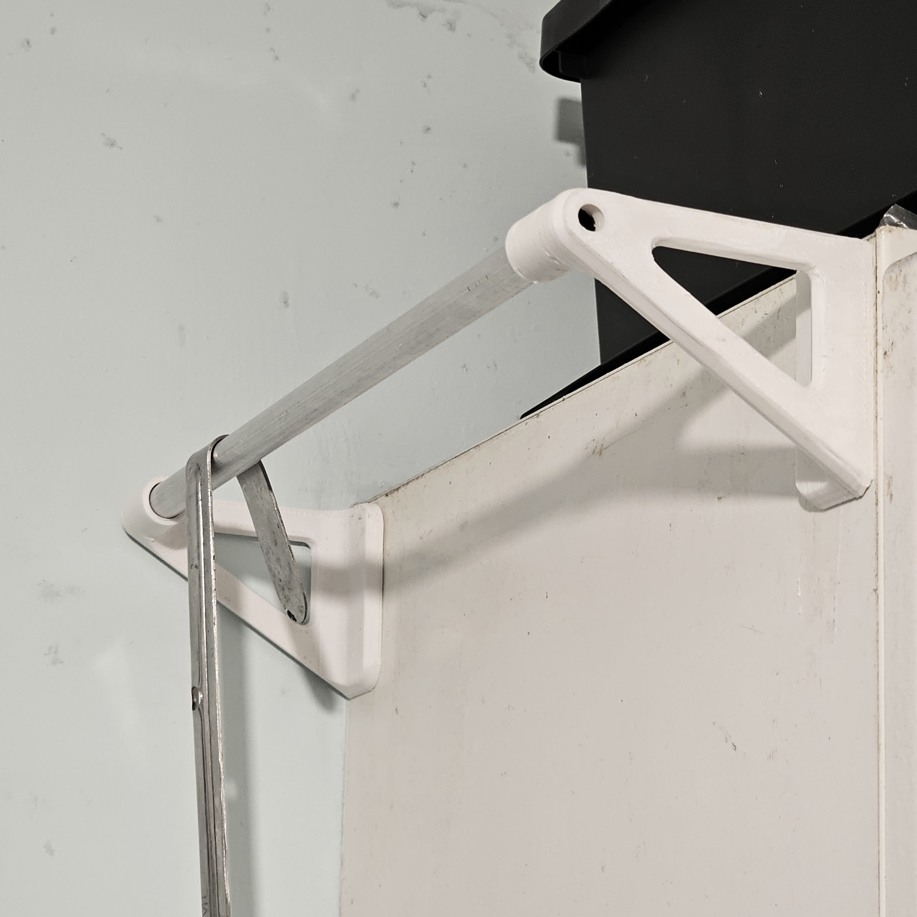 Wall mounted utencils holder