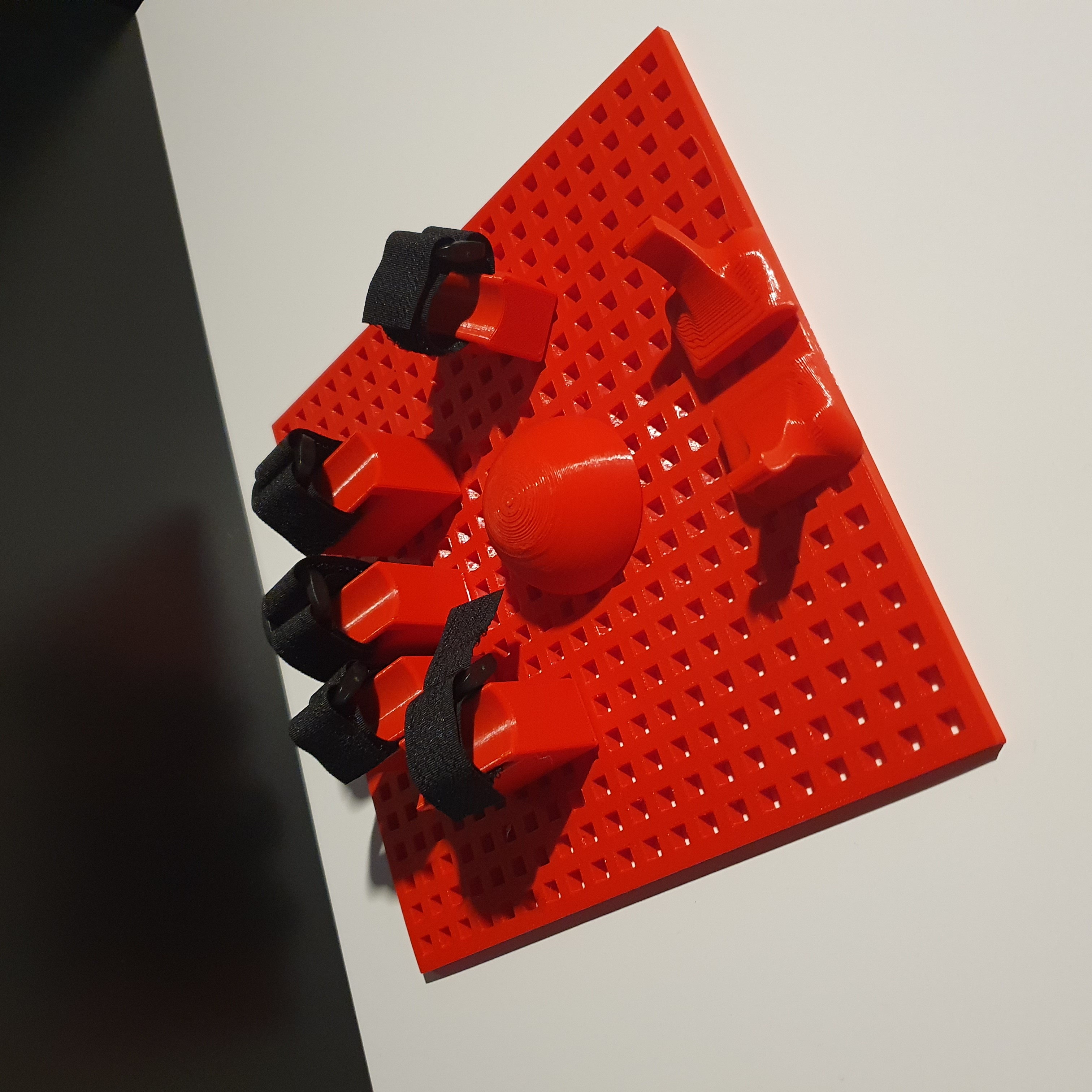 Customizable fixation for a paralyzed hand