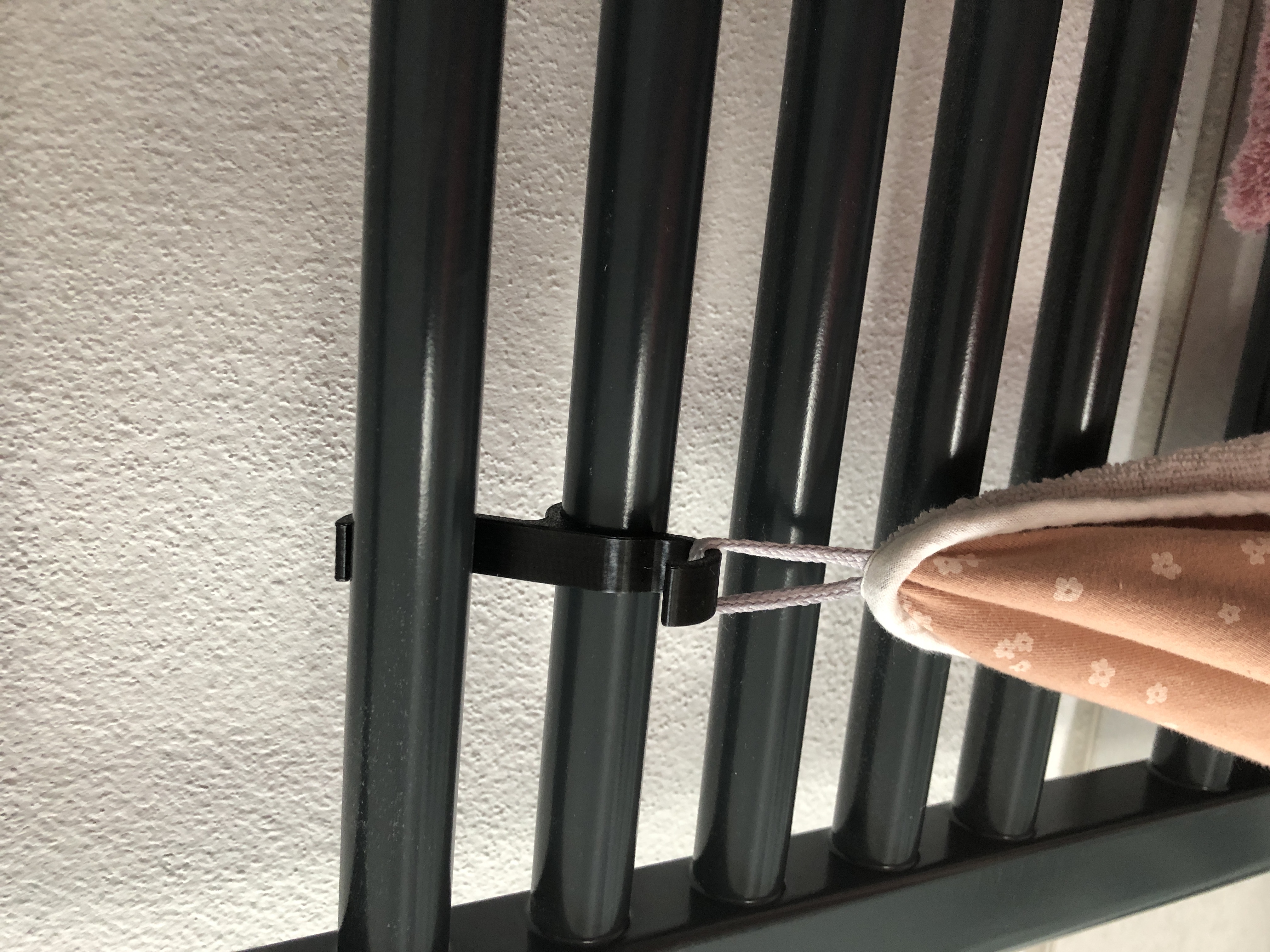 Hook for towel radiator