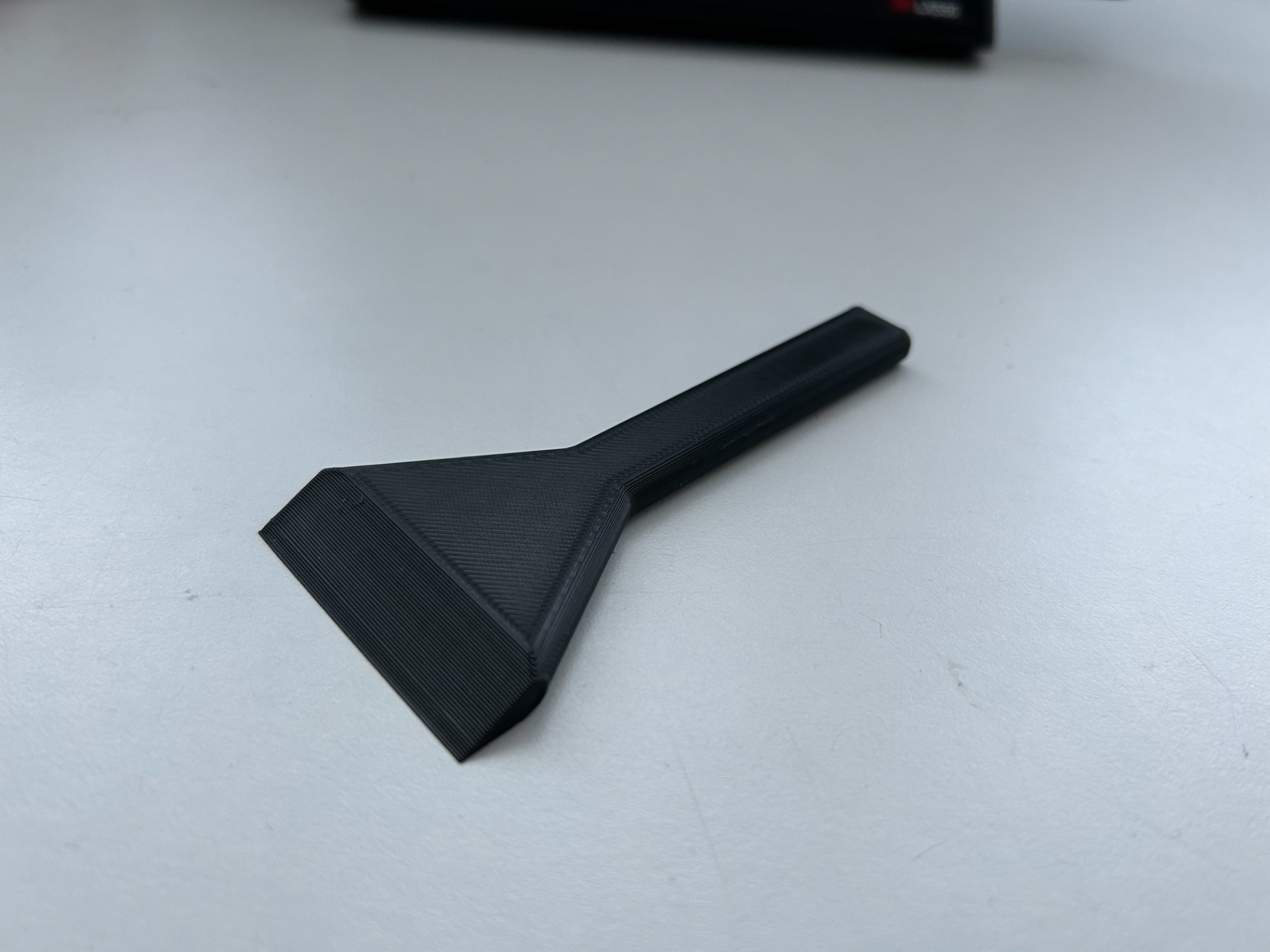 Bed scraper