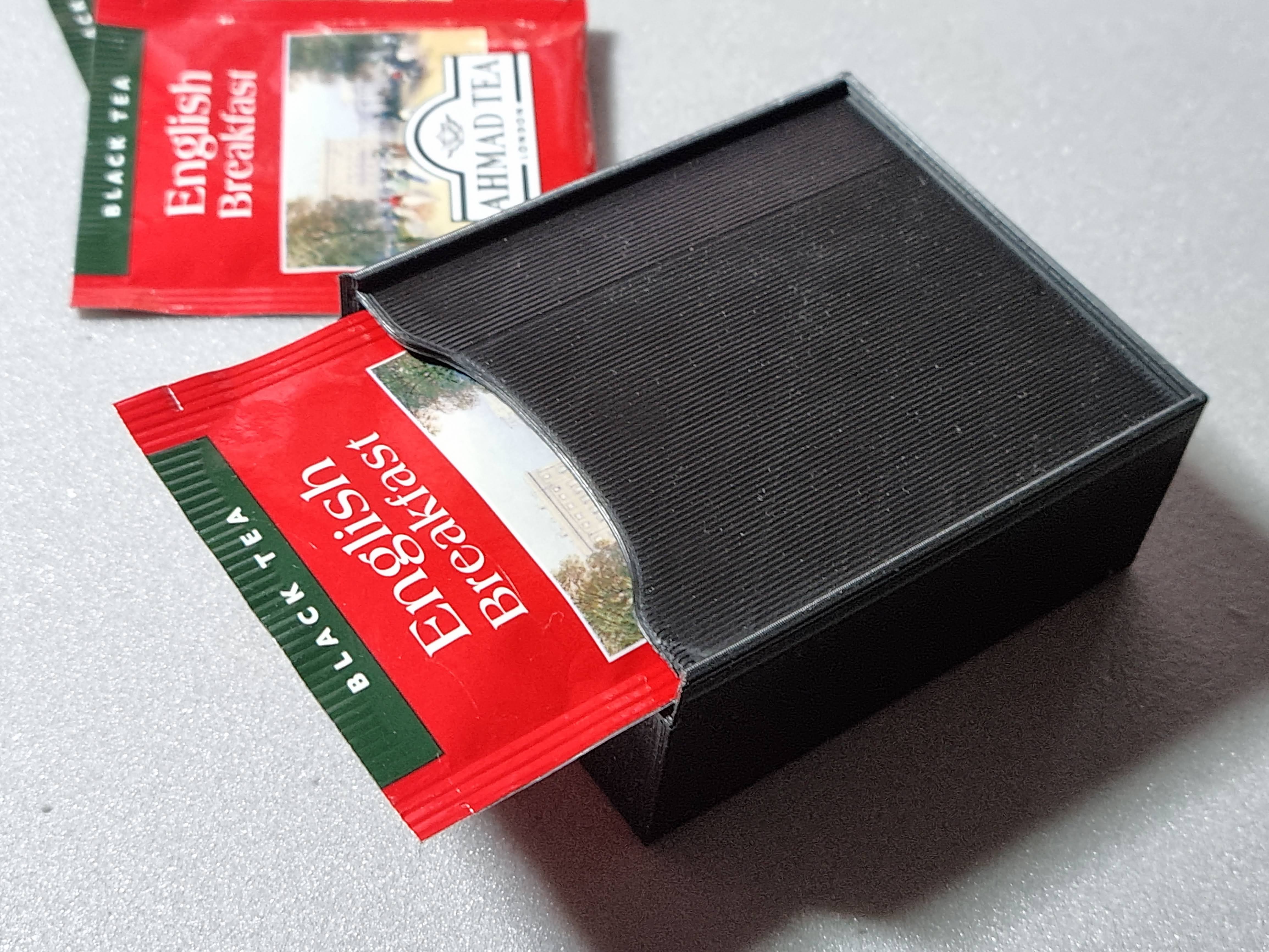 Spring-loaded tea box