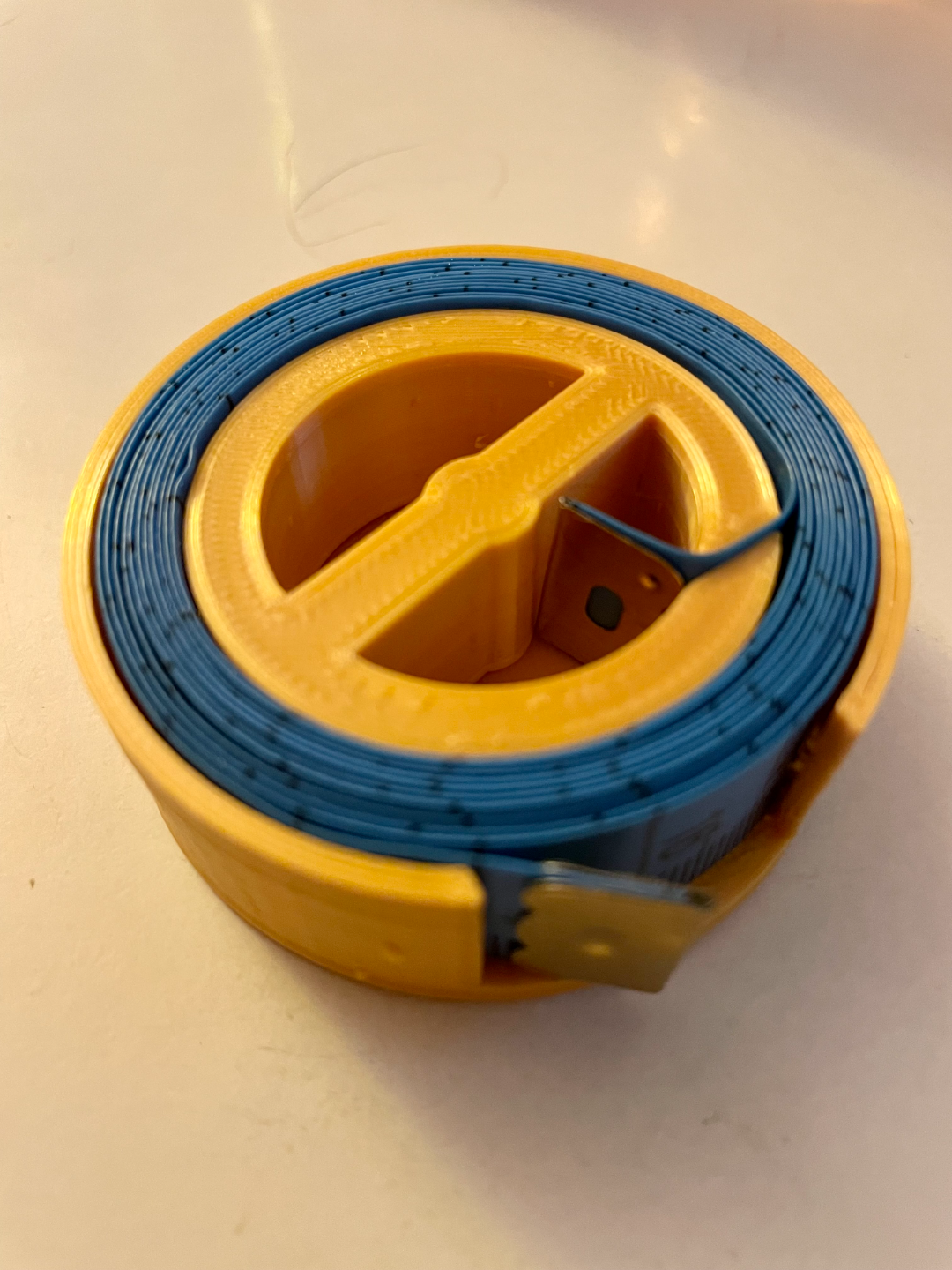 Case for a tailor's tape measure.