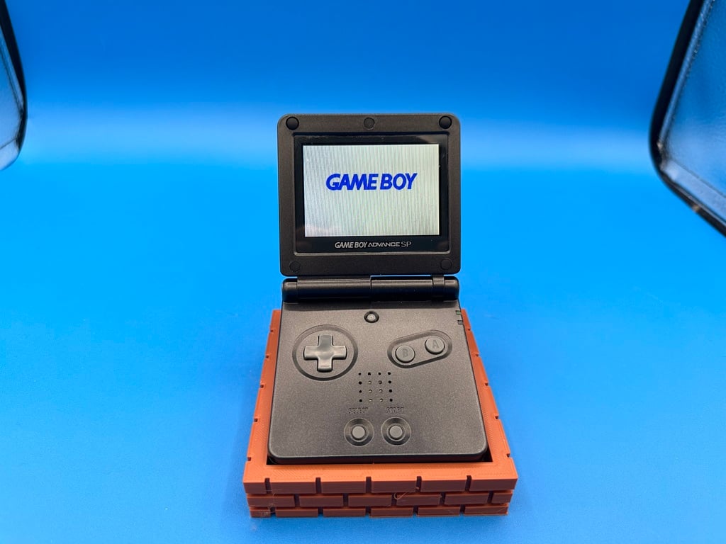 Game Boy Advance SP themed brick display stand