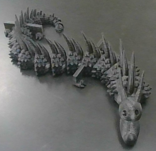 Movable chain link dragon