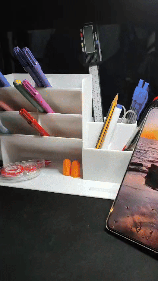 Pen with a holder for the mobile
