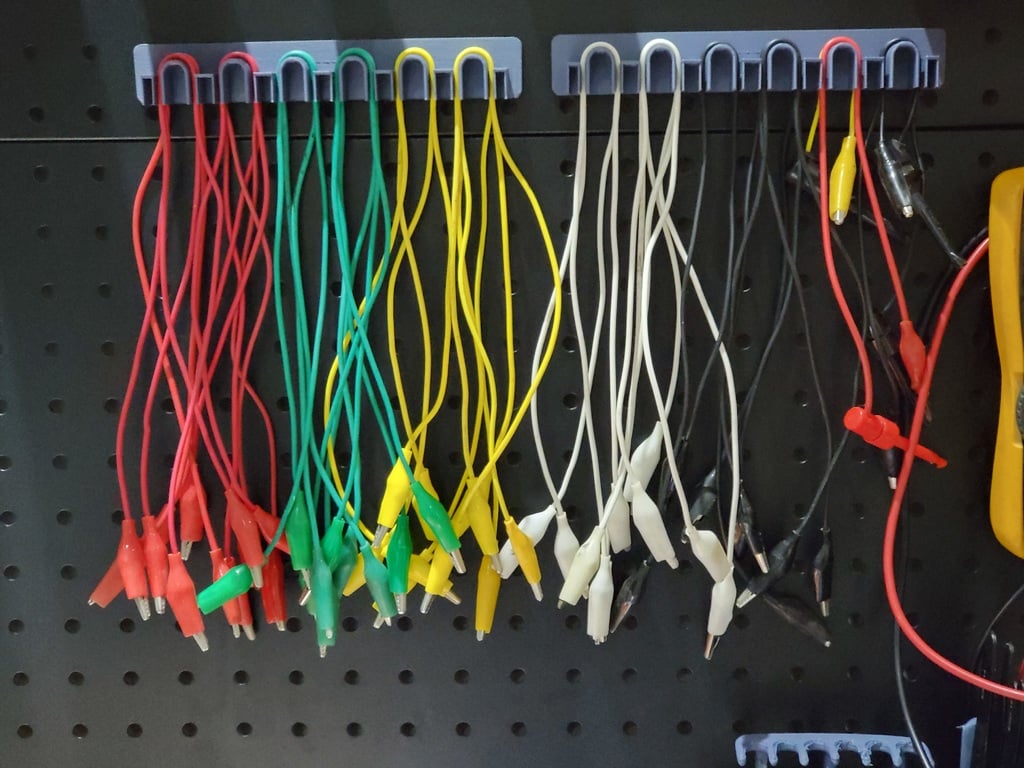 Pegboard Mounted Alligator Clip Cable Organizer