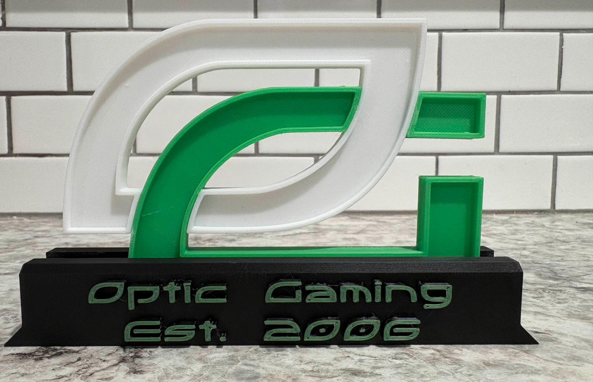 Optic Gaming Logo & Stand