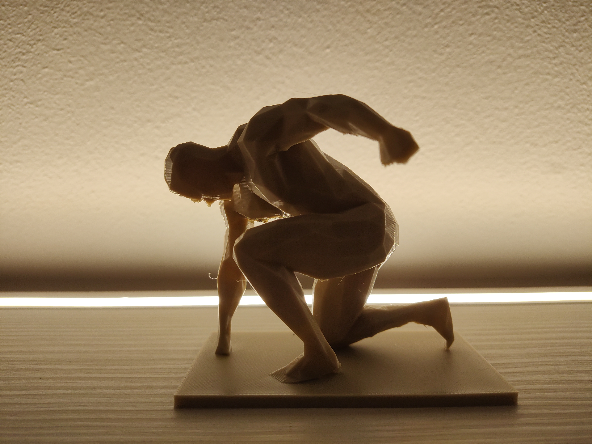 Kneeling man low poly