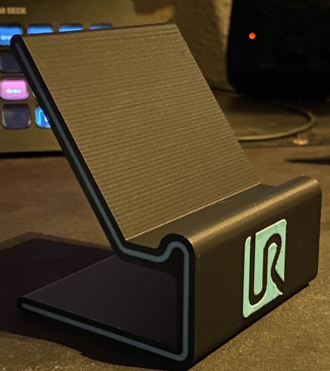 Phone stand with accent