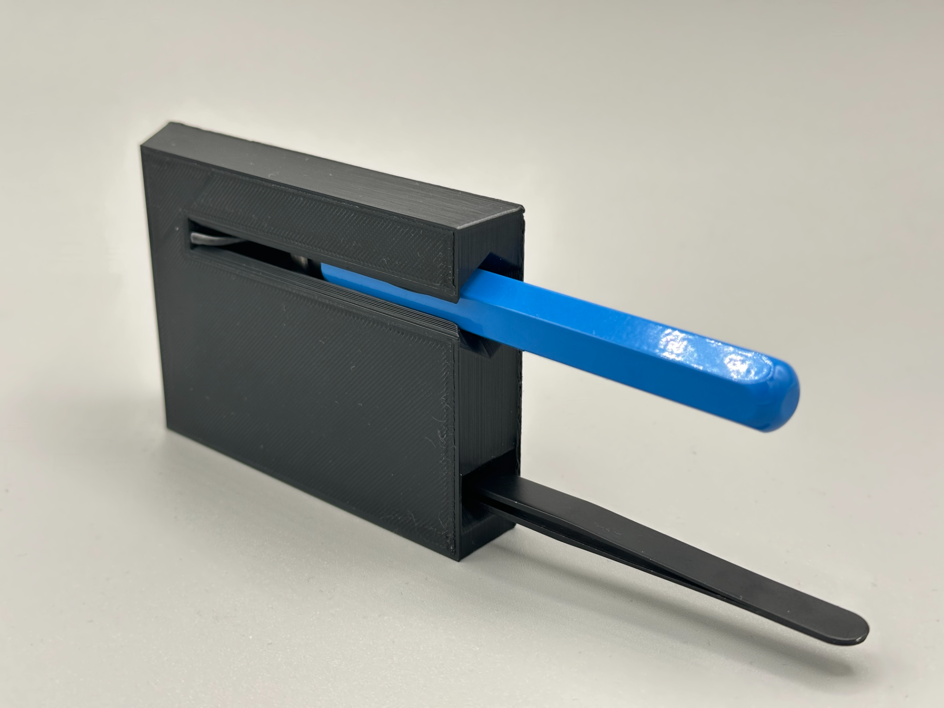 Magnetic deburring tool and tweezers holder
