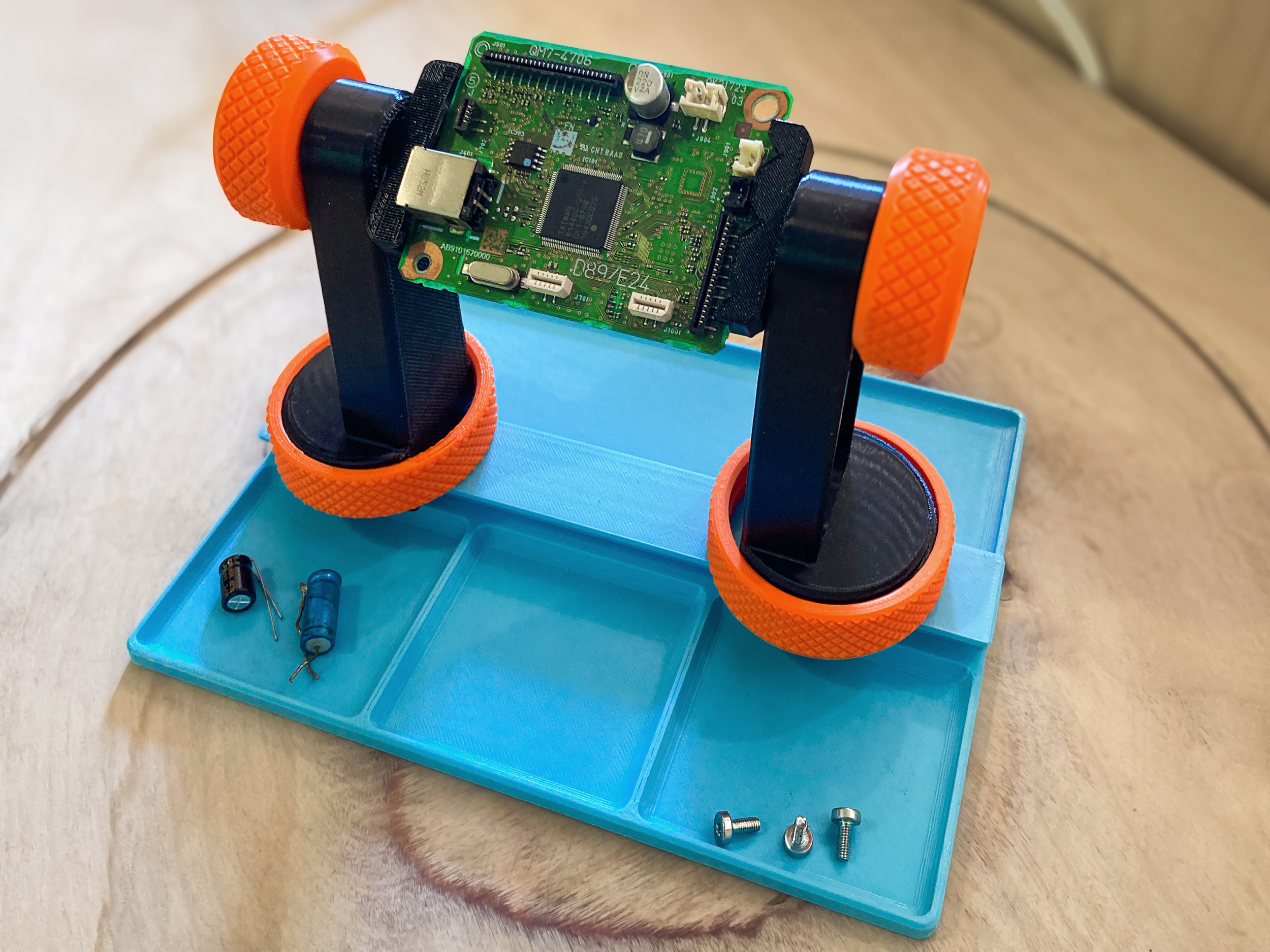 Component organiser base for PCB clamp