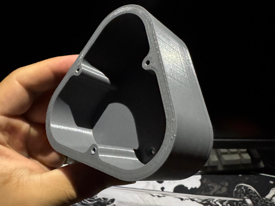 Triangular wall socket adapter